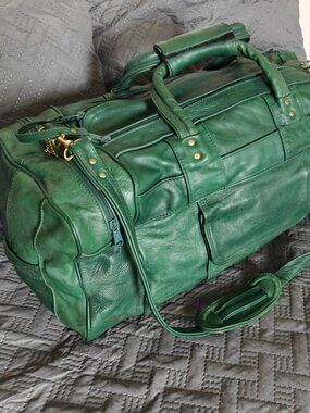 100 percent leather green duffel